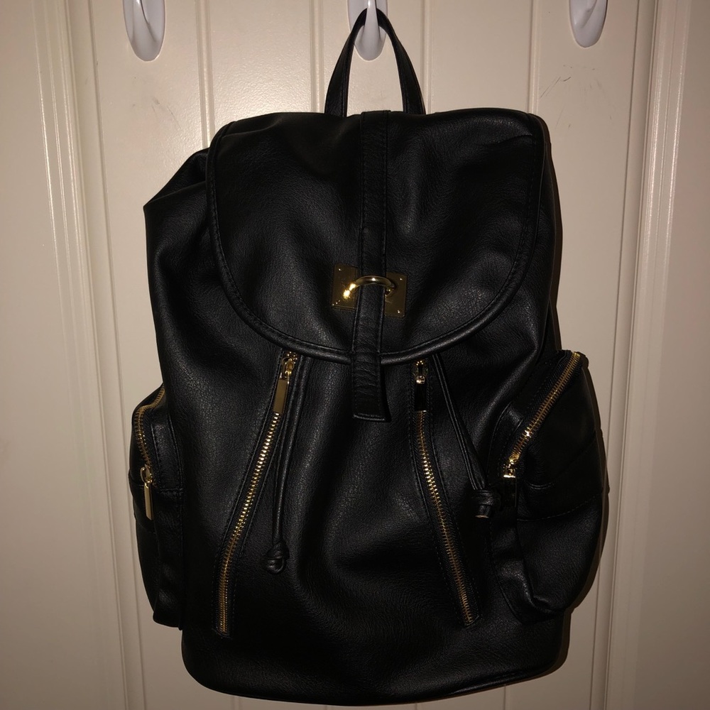 Black Backpack with Gold Accessories